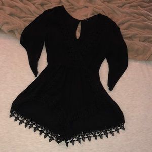 Black romper with lacey bottom/V neck